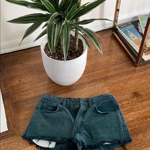 Distressed green Levi shorts